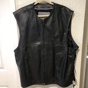 Unik mens size 4XL black motorcycle leather vest with lace up sides.